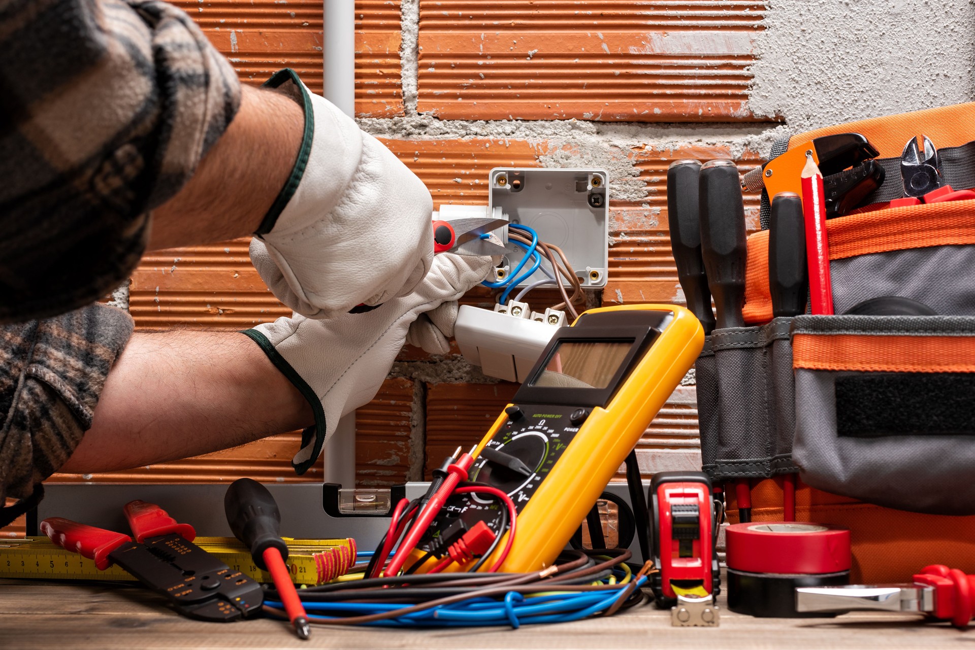 Electrician at work on a residential electrical system. Electricity.